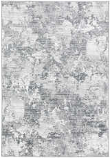 Close-up of the Dalyn Rhodes RR4 Gray Area Rug. Abstract design in chestnut, cream, silver gray, and taupe.