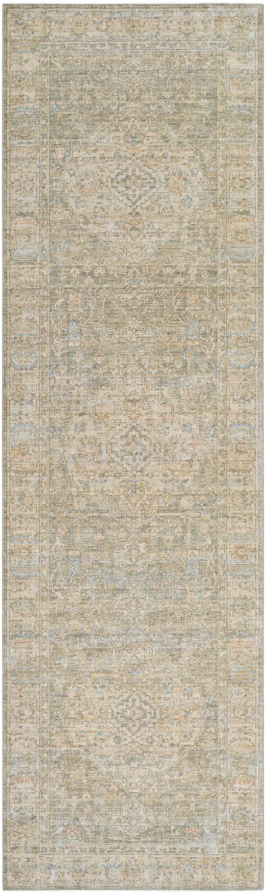 Close-up of the Becki Owens x Livabliss Renaissance BORI-2302 rug. Beige, denim, coral, and tan traditional wool rug. Design-Runner