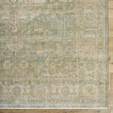 Close up of the Becki Owens Renaissance BORI-2302 rug. Beige, denim, coral, and tan farmhouse style floral pattern. Corner