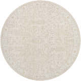 Round Rafee Tan Luxe Area Rug. Cream, ivory, and tan rug with a traditional, geometric pattern. Machine woven polyester. Design-Round-7