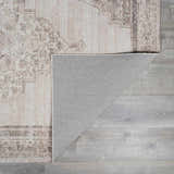 Close up of the beige and dark brown Luciana III Traditional Medallion Area Rug showing pattern and backing. Fold
