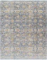 Close-up of Ren Outdoor Becki Owens x LIVABLISS BOMG-2300 rug. Machine woven with charcoal, gray, brown, navy, and taupe floral pattern. Design-Rectangle-71010