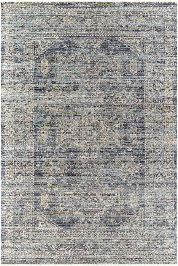 Close-up of the Margaret Outdoor Becki Owens x LIVABLISS rug. Machine woven with a traditional pattern in black, blue, gray, and taupe. Design-Rectangle-537