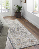 Entryway with Ivria Navy & Rust Area Rug. Traditional rug with light gray, natural gray, and rust tones on wood floor. Roomscene-Runner