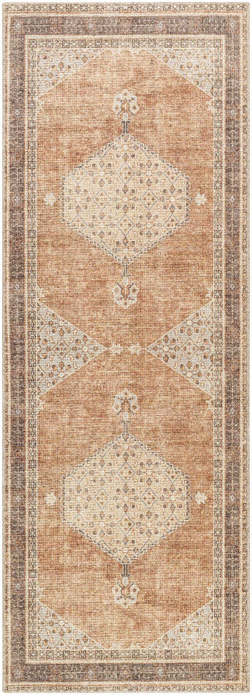 Close-up of the Lila Becki Owens x LIVABLISS rug. Traditional design in tan, off-white, charcoal, and dark red. Machine woven texture. Design-Runner-2773