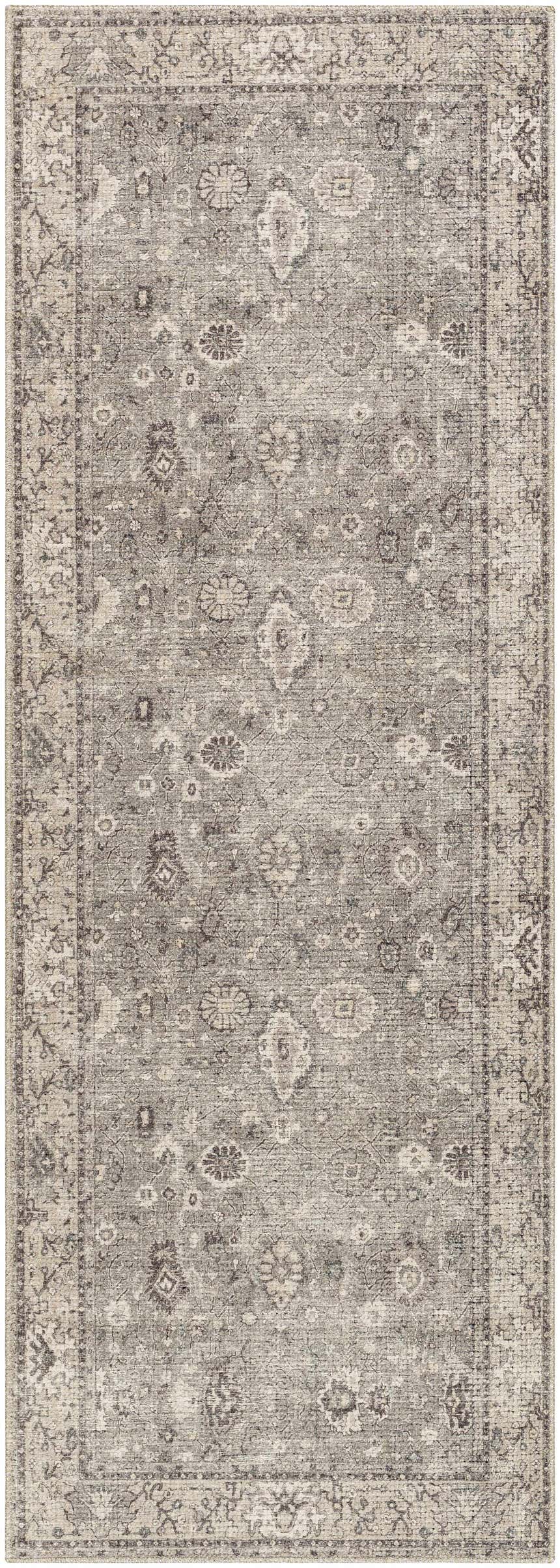 Close-up of the Davina Becki Owens x LIVABLISS BOCC-2301 Area Rug. Machine woven rug in charcoal, light gray, and taupe with traditional design. Design-Runner-2773