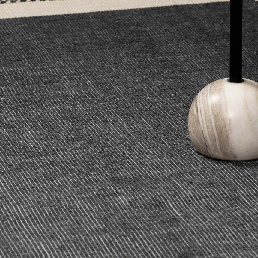Ailie Bordered Charcoal Wool Rug