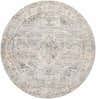 Close-up of round Addax Area Rug: neutral tones, traditional pattern in gray, brown, and blue. Machine woven polyester rug. Design-Round-67