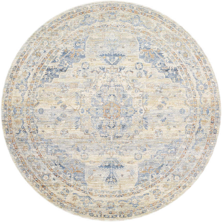 Close-up of round Bora Area Rug - Clearance. Traditional style rug in camel, copper, blue, and gray tones. Machine woven polyester. Design-Round-67