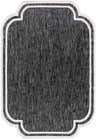 Close-up of Arnola Black Outdoor Rug featuring a black and cream color palette and farmhouse style. Design-Rectangle-537