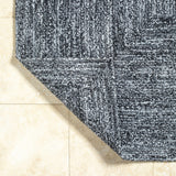 Kenyi Black Area Rug - Clearance