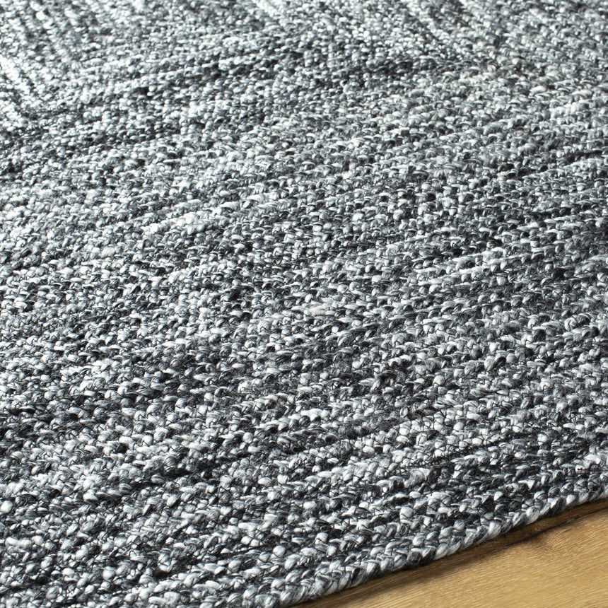 Kenyi Black Area Rug - Clearance