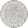Close-up of the round Hafsa Textured Rug. Gray, nutmeg, and blue floral pattern on a light gray background. Design-Round