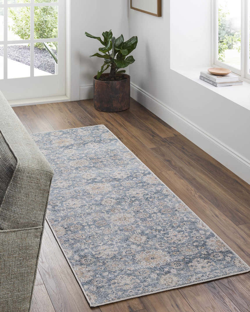 Entryway with light gray Metin Area Rug runner, wood floors, gray sofa, and natural light. Roomscene-Runner