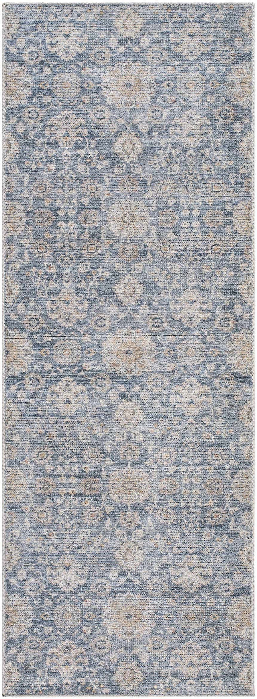 Close-up of the Metin Area Rug. Light gray and natural gray farmhouse style rug with a traditional floral pattern. Design-Runner-2773