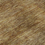 Close-up of the dark brown Dalyn Luxury Soft Essentials Walnut Washable Area Rug, showing texture and pattern.