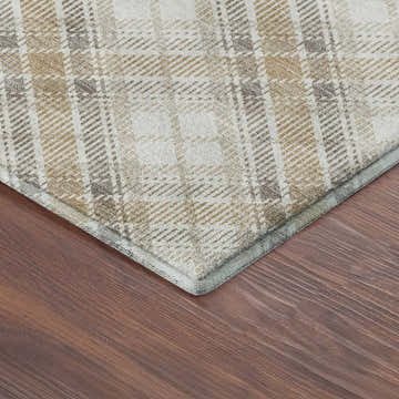 Close up of Dalyn Luxury Soft Essentials Ivory rug with a chestnut and ivory plaid pattern.