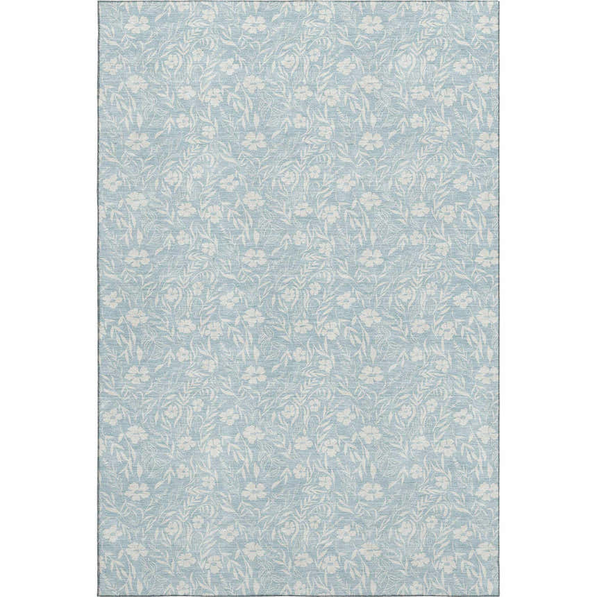 Close-up of Dalyn Luxury Soft Essentials SE4 Sky Washable Area Rug, featuring a delicate white floral pattern on a sky blue background.