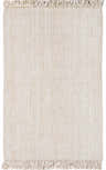 Close-up of a Senneterre Bleached Jute Rug. Cream color, hand woven texture, and fringe detail. Design-Rectangle