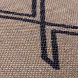 Close-up of the Hamid Washable Jutely Rug showing a woven texture and geometric dark brown pattern on a natural jute background. Texture