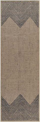 Close-up of the Suzy Washable Jutely Rug in camel. Features a geometric, dark brown zig-zag pattern on a jute-textured background. Design-Runner-268