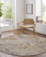 Bright room with round Chas Tan rug, wood floors, and a woven chair. Roomscene-Round
