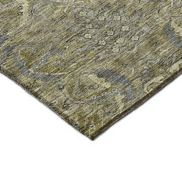 Close-up of the Dalyn Luxury Solace SL7 Taupe Washable Area Rug, showing beige, olive, and light brown tones with a floral pattern.