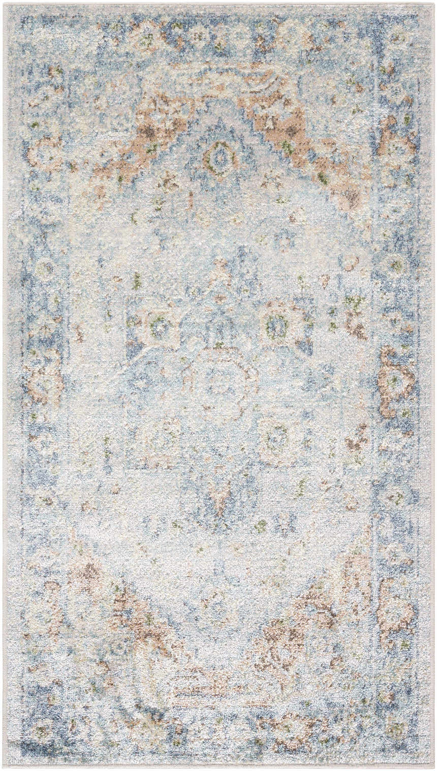 Close-up of the Ezri Washable Area Rug. Farmhouse style rug in beige, light blue, and orange with a traditional pattern. Design-Rectangle-2339