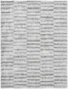 Close-up of the Anevay Dark Gray Area Rug, a soft shag rug with a subtle light slate and gray striped pattern. Design-Rectangle-537