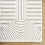 Close-up of the Deron Ivory 3D Rainbow Washable Rug. Off-white raised geometric design on a light gray background. Corner