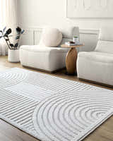 Living room scene with two white chairs and the Deron Ivory 3D Rainbow Washable Rug on a wood floor. Roomscene-Rectangle