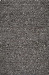 Close-up of the Sevan Black Wool Area Rug, a hand-tufted rug with a textured mix of jet black, medium gray, and taupe fibers. Design-Rectangle-576