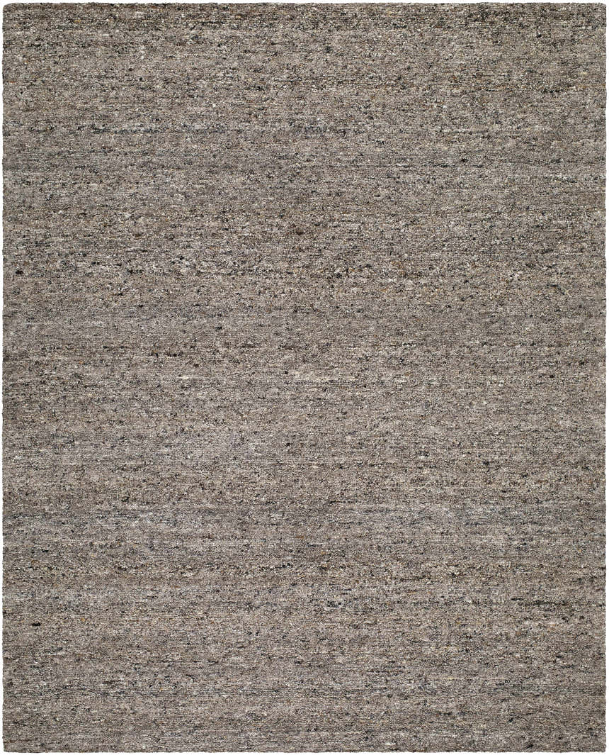 Close-up of the hand-tufted Sevan Taupe Wool Area Rug. Neutral taupe color with subtle texture and wool fibers. Design-Rectangle-810