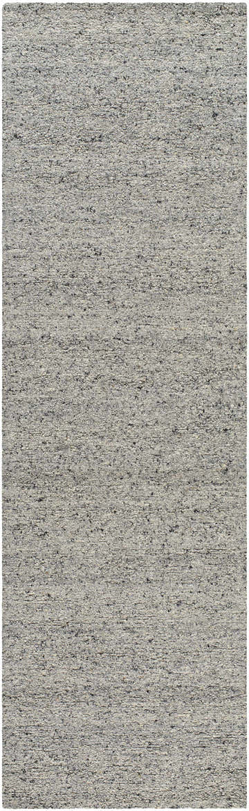 Close-up of the Sevan Gray Wool Area Rug, showing its textured, hand-tufted weave and subtle ash, sage, and silver gray tones. Design-Runner-310