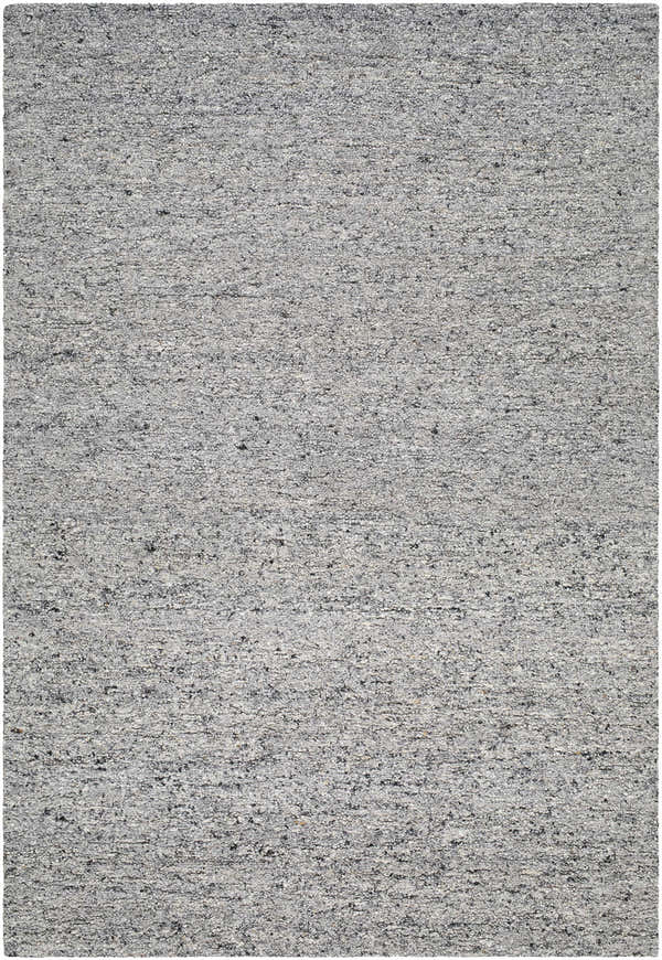 Close-up of the hand-tufted Sevan Gray Wool Area Rug, showing ash, gray, and silver gray tones and textured wool design. Design-Rectangle-576