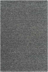 Detailed texture of the Sevan Charcoal Wool Area Rug, a hand-tufted rug in shades of black, gray, and steel gray. Design-Rectangle-576