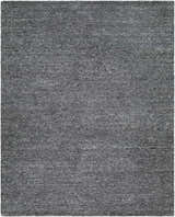 Close-up of the hand-tufted Sevan Charcoal Wool Area Rug. Features black, gray, and steel gray tones. Design-Rectangle-810