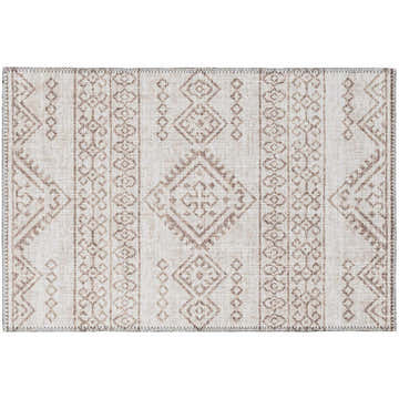 Close-up of the Dalyn Sedona SN14 Putty Washable Area Rug. Features a farmhouse-style diamond and geometric pattern in putty, ivory, and chestnut.