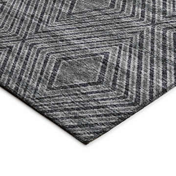 Close-up of the Dalyn Sedona SN1 Midnight Washable Area Rug. Features a diamond pattern in black, midnight, and taupe hues.
