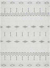 Close-up of Sokka Area Rug. Cream and light gray geometric design with diamond and stripe patterns. Contemporary style. Design-Rectangle-537