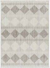 Close-up of the Igone Area Rug. Beige rug with brown diamond pattern and fringe. Farmhouse style. Design-Rectangle-527
