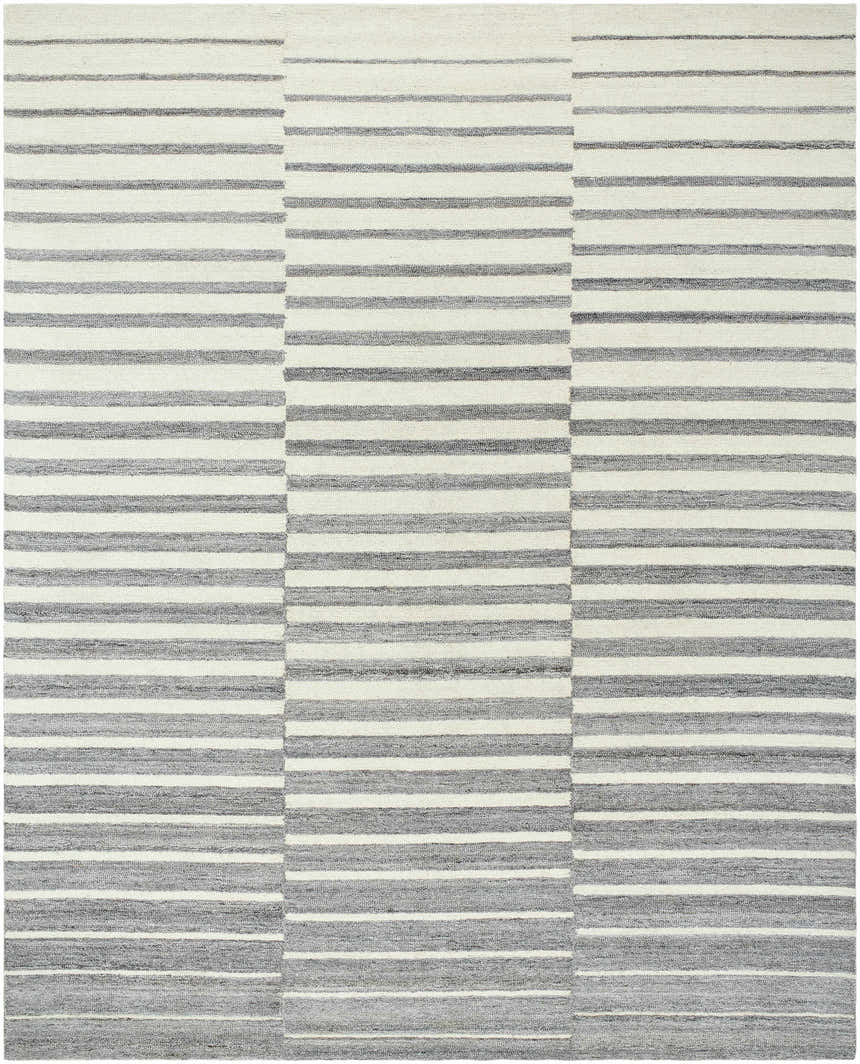 Close-up of the Gawel Gray Area Rug. Hand-tufted wool rug with a contemporary stripe pattern in gray, light gray, and charcoal. Design-Rectangle-810