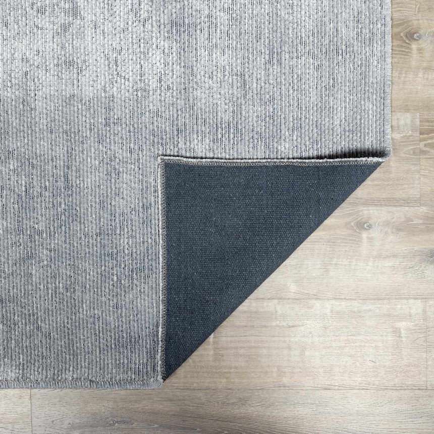 Isako Blue & Gray Solid Washable Area Rug - Clearance