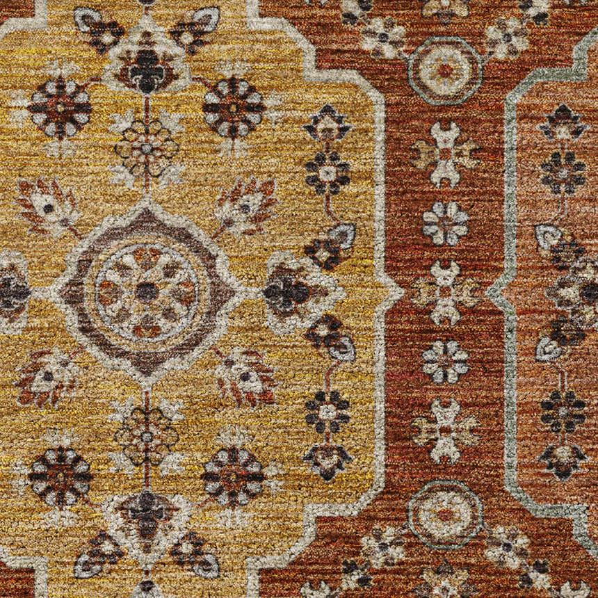 Close-up of Dalyn Silk Road SR7 Paprika rug. Caramel, gold, and paprika floral pattern with farmhouse style texture.