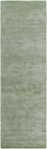 Close-up of the Helio Area Rug in sage. Hand-tufted viscose rug with a subtle horizontal stripe pattern. Design-Runner-310