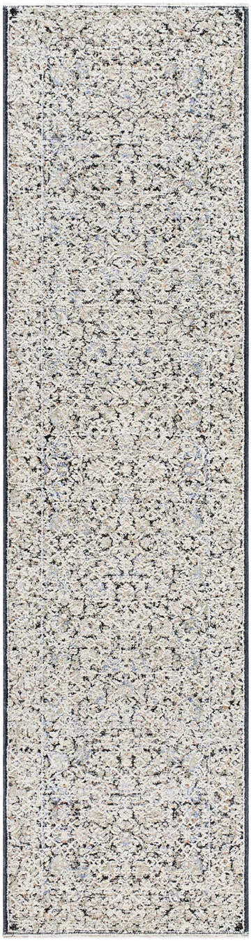 Close-up of the Haran Cloud Gray Area Rug, a machine-woven rug with a farmhouse style pattern in cloud gray and medium gray. Design-Runner-2710