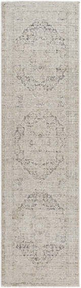 Close-up of the Njeri Area Rug. Beige farmhouse style with a traditional medallion pattern and subtle texture. Design-Runner-2710