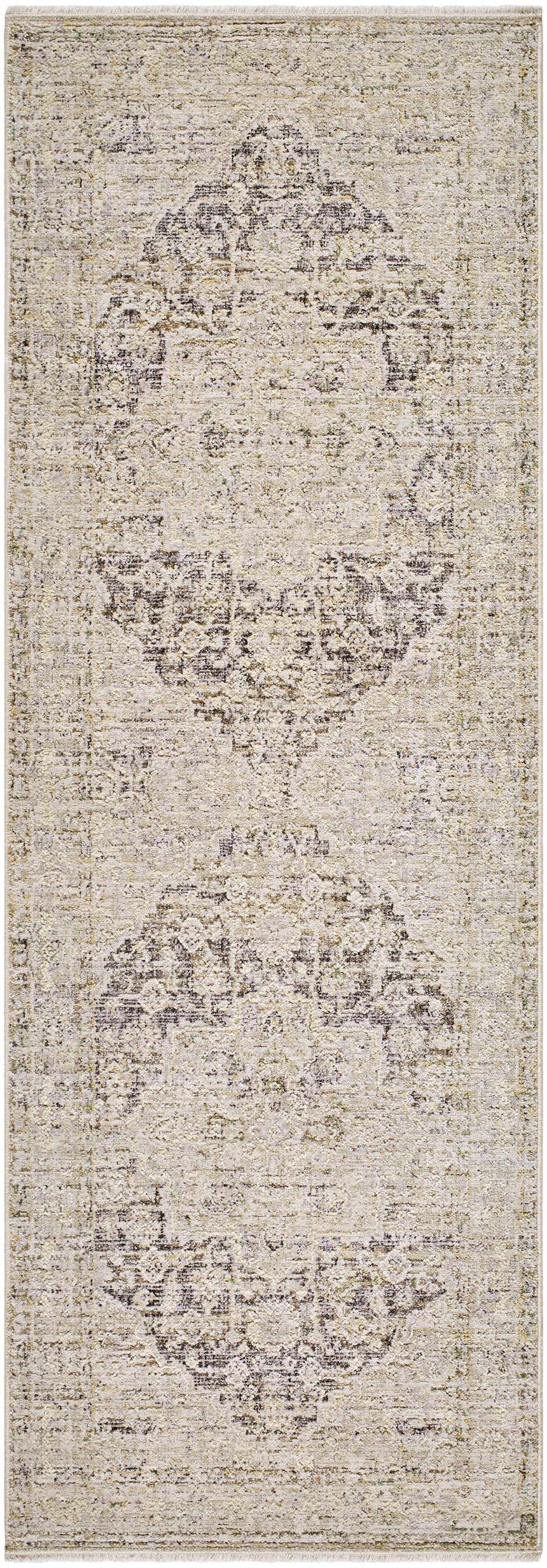Close-up of the Njeri Area Rug in Beachhouse Beige. Features a traditional, distressed medallion pattern and subtle texture. Design-Runner-27710