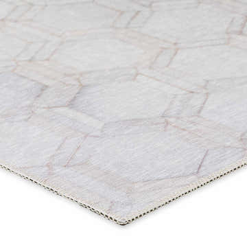 Close-up of the Dalyn Durango SS1 Linen Washable Area Rug, showing beige and taupe geometric pattern and textured weave.
