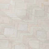 Close-up of the Dalyn Durango SS5 Linen Washable Area Rug. Beige, taupe, and chestnut geometric pattern. Machine-made texture.
